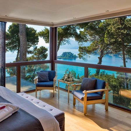 โรงแรมคอร์ฟูฮอลิเดย์พาเลส เปรามา ภายนอก รูปภาพ A room at the hotel